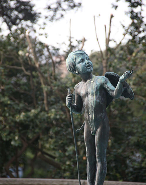Close up of the Cupid statue in the Pioneer Memorial Garden