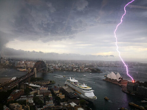 Lightning bolt strikes Sydney Harbour near Opera House