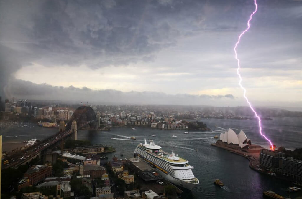Lightning bolt strikes Botanic Garden next to Sydney Harbour, near Opera House