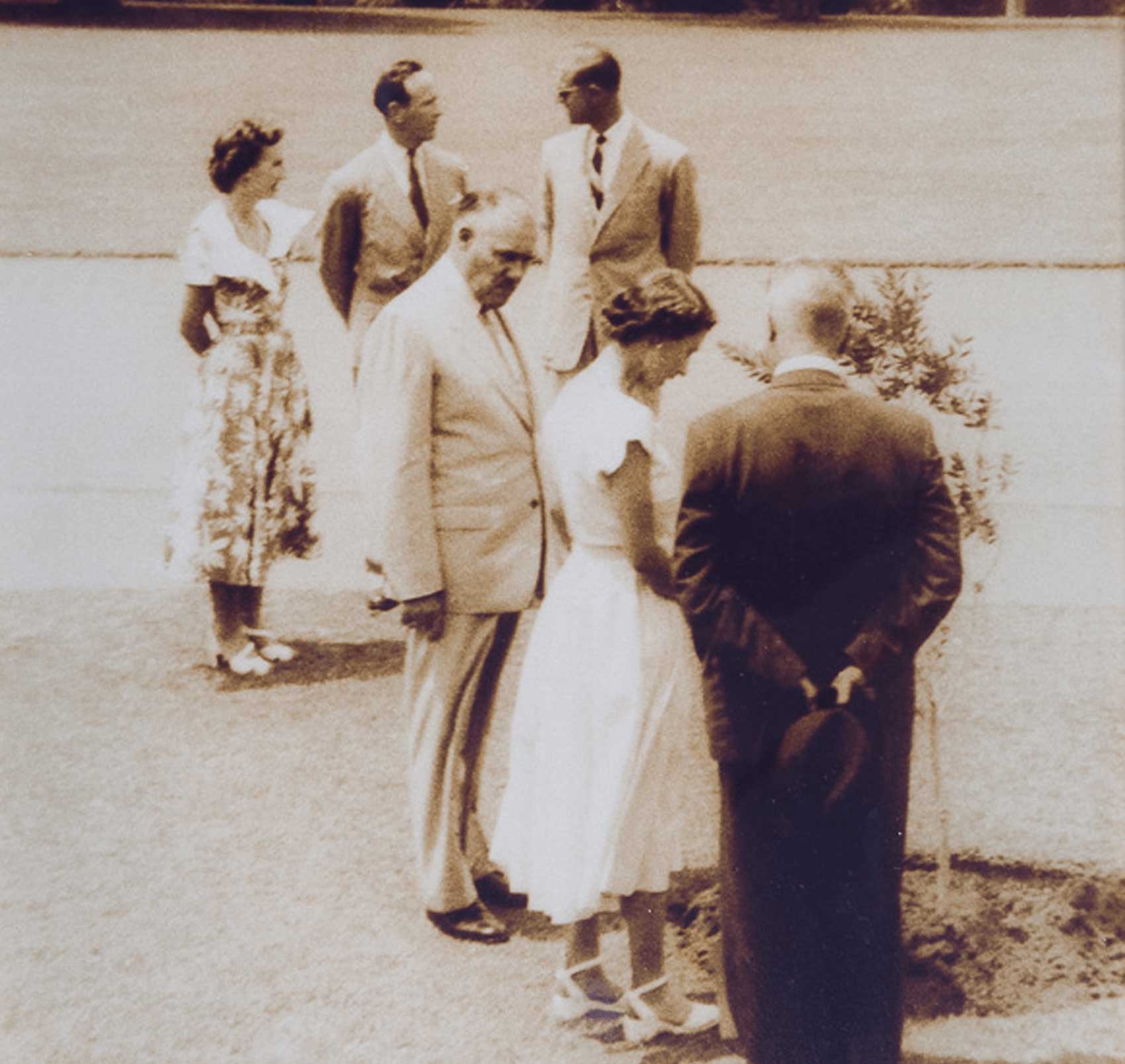 Queen Elizabeth II planting a tree during her visit