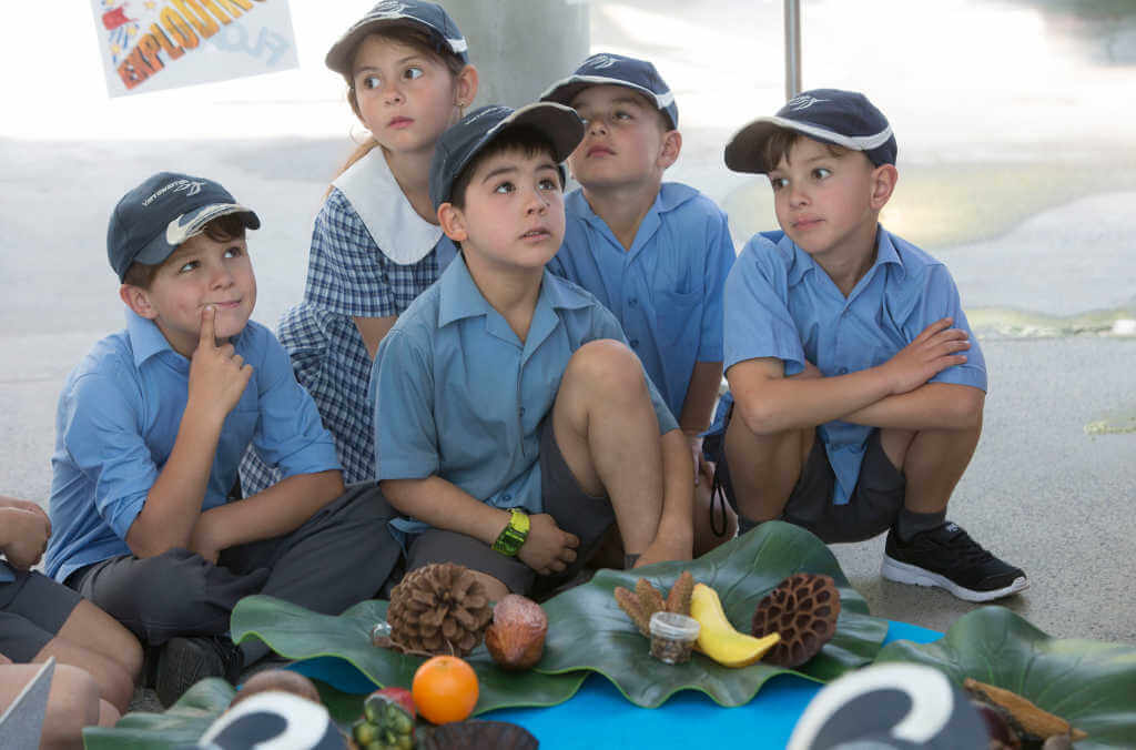 aboriginal tour kids and traditional fruit close up