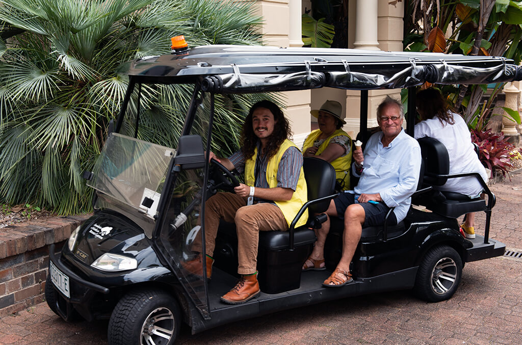 People on a buggy at the Garden