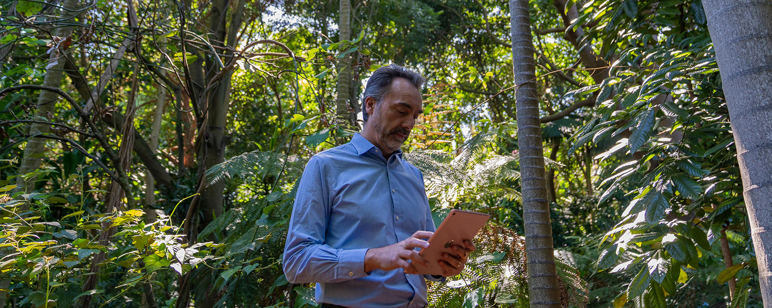 Scientist Maurizio Rossetto collects field data with a tablet