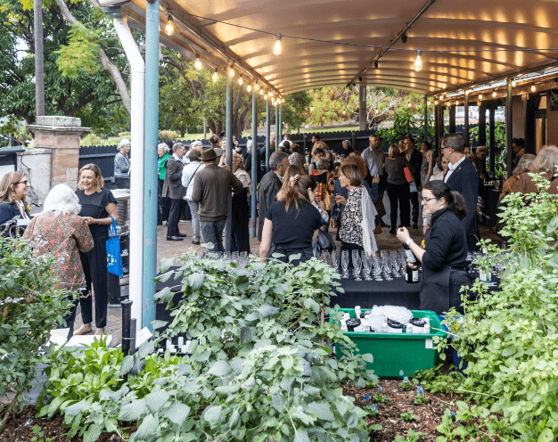 People mingling on a Garden patio
