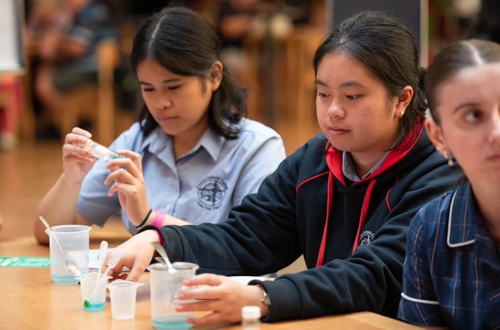 school children doing experiment