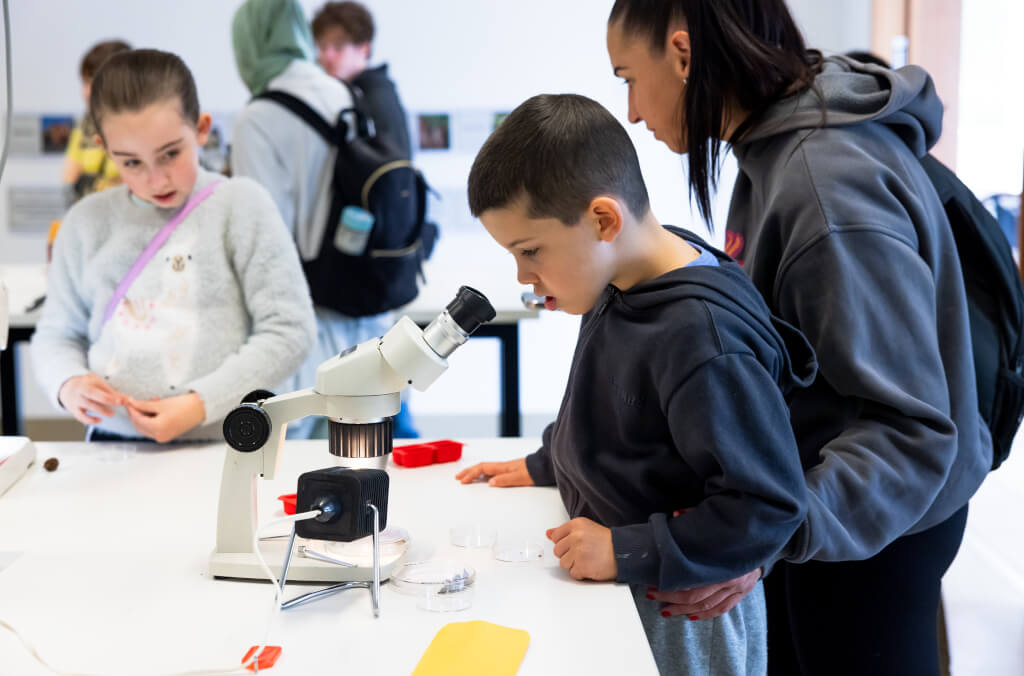 education-abg-kid-looking-into-microscope-1024x676.jpg