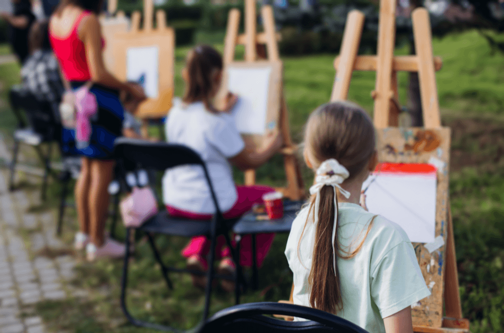 events-spring-kids-enjoying-painting-at-the-garden-1024x676.png