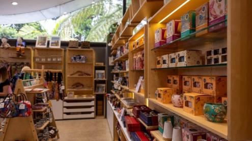 Shop display shelves with garden-inspired gifts, art and homewares