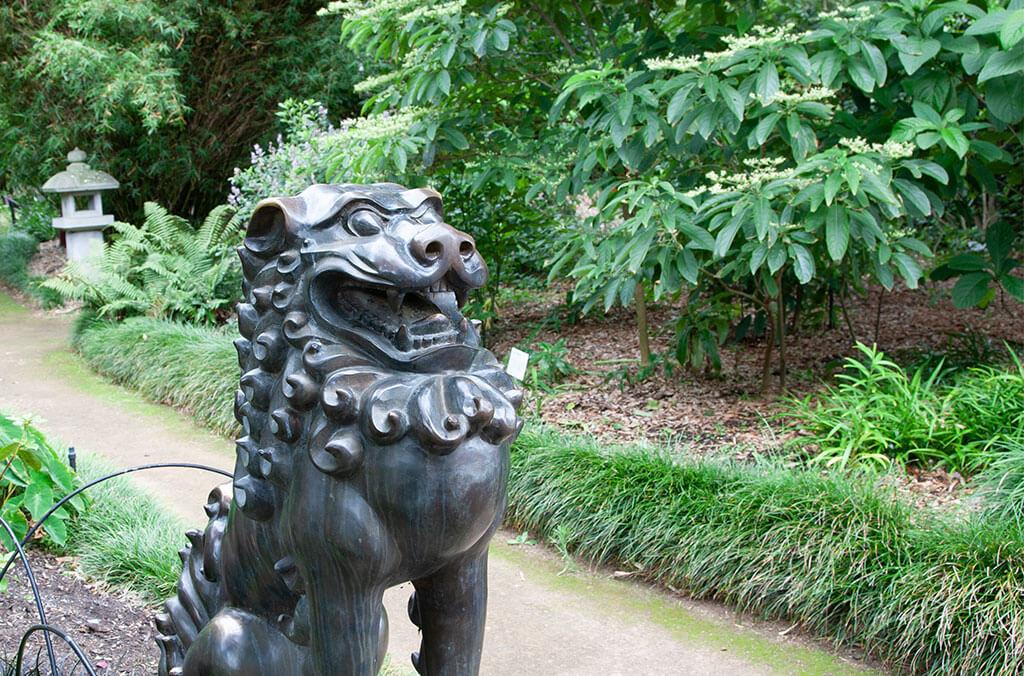 Close up of one of the Thai temple lions that guard the HSBC Oriental Garden