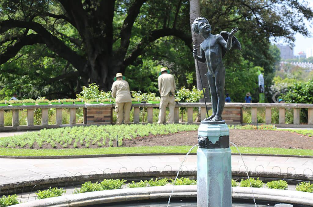 A Cupid stands above the pond in the Pioneer Memorial Garden