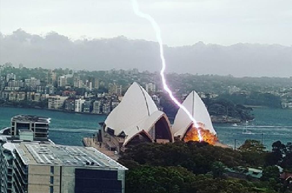aerial shot of lightning striking the Royal Botanic Garden Sydney, nest to the Opera House