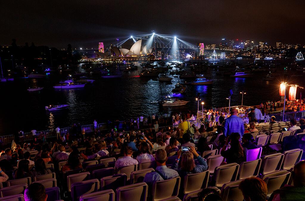 People on the shore of Sydney Harbour awaiting the New Year's Eve fireworks