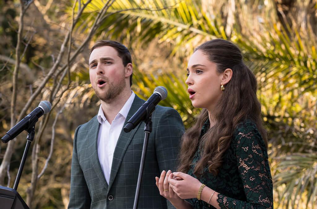 Two opera singers perform in the Garden