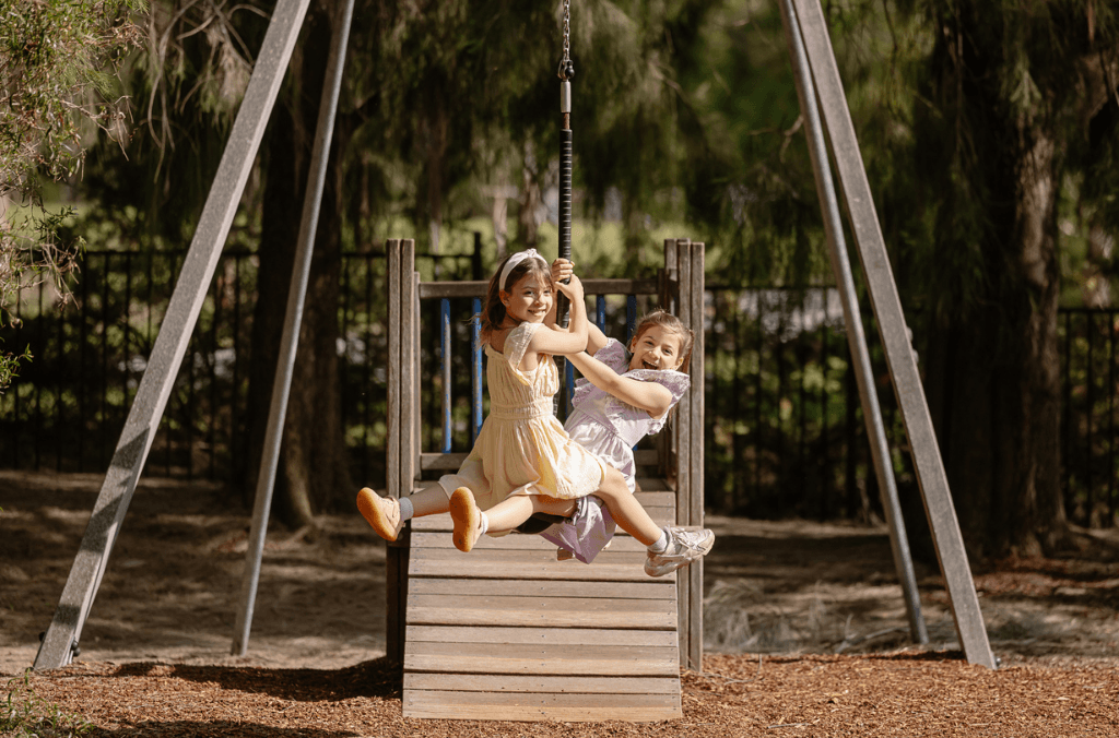 events-sisters-enjoying-swing-1024x676.png